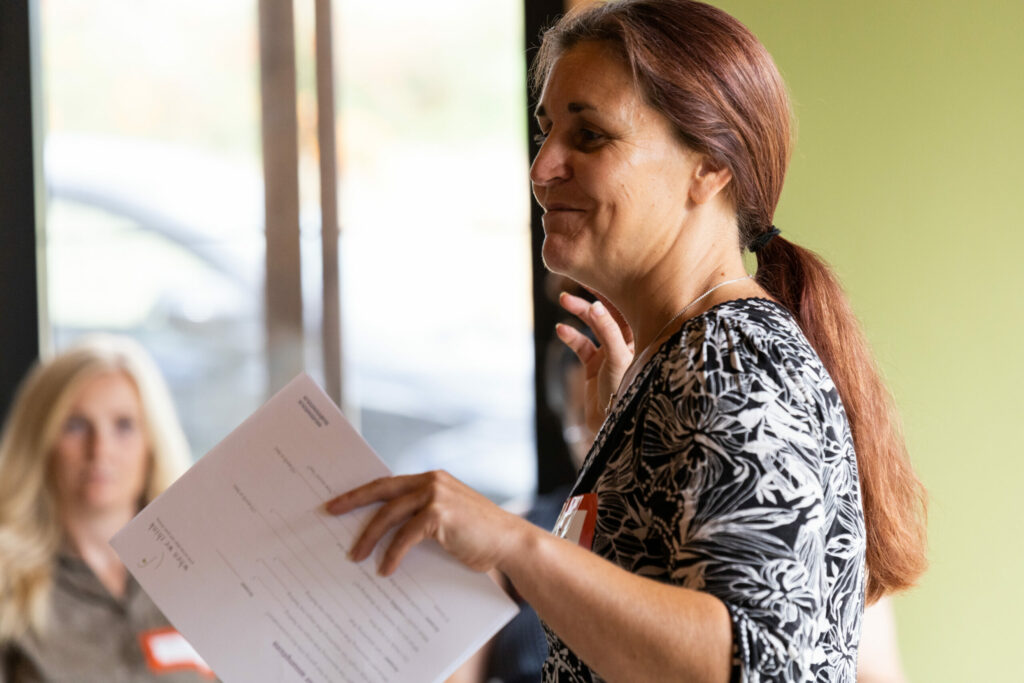 A close up image of Becca Timmins who is standing and leads a workshop session at the Big Day Out 2022