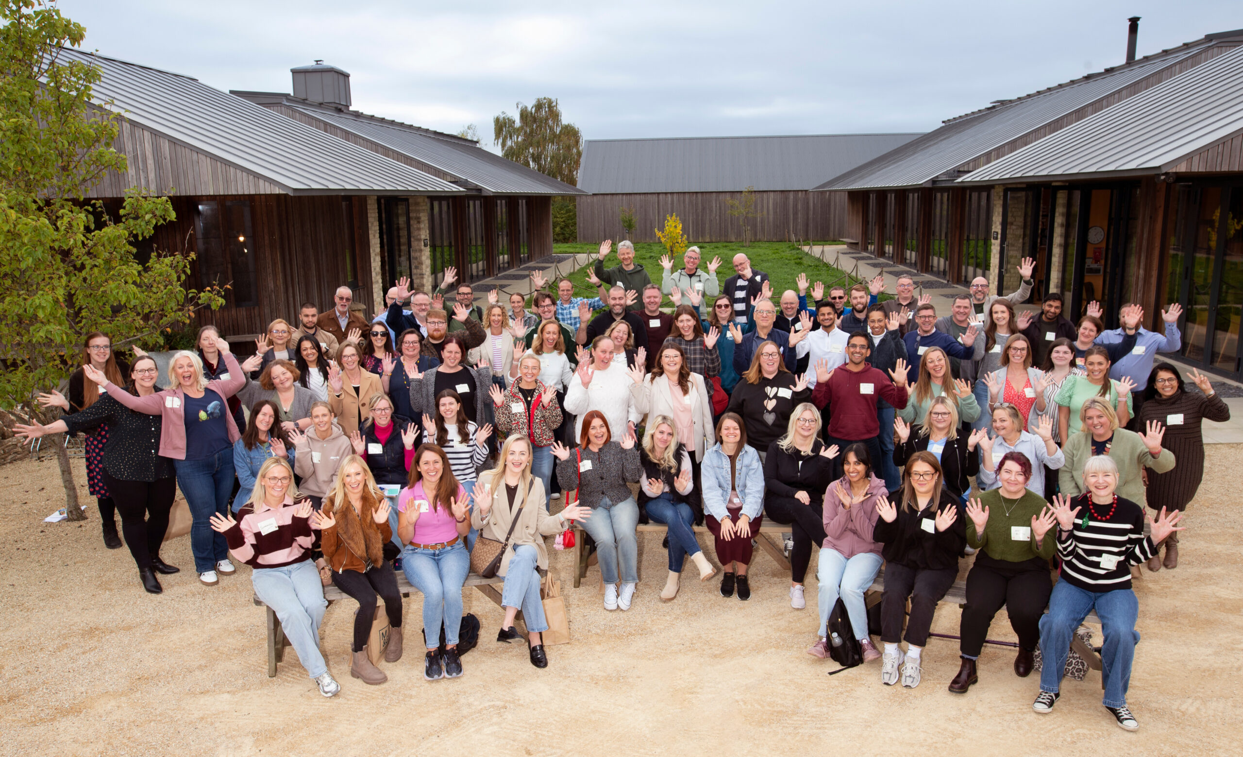 Participants in The Big Day Out 2025 are pictured in a group photo in front of the FarmED farm education centre